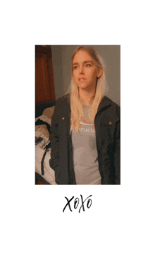 a woman wearing a t-shirt that says xoxo