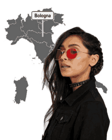 a woman wearing red sunglasses is standing in front of a bologna map