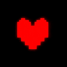 a pixel art red heart is glowing in the dark on a black background .