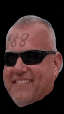 a man with sunglasses and a tattoo on his forehead with the number 88