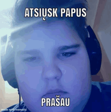 a boy wearing headphones with a caption that says atsiusk papus prasau