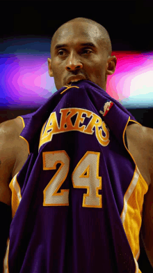 basketball player wearing a lakers jersey with the number 24 on it