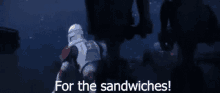 a clone trooper is running in the dark with the words `` for the sandwiches '' written on the screen .