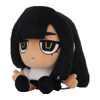 a stuffed doll with long black hair and a yellow u on its eyes