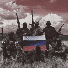 a group of soldiers are posing for a picture while holding a russian flag