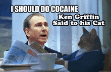 a man sitting at a table with a newspaper and a cat that says i should do cocaine on it