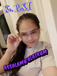 a woman wearing glasses says assalamualaikum on the bottom right