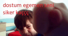 a child 's face is shown with the words dostum egemen seni siker kacc on the bottom right