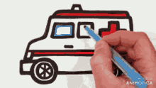 a person is drawing an ambulance with a marker