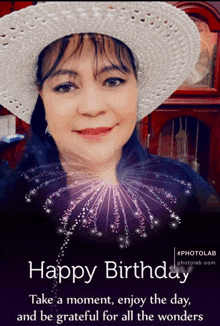 a woman wearing a white hat with the words happy birthday on the bottom