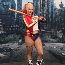 a woman in a harley quinn costume holds a baseball bat