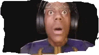 a man wearing headphones and a purple shirt is making a funny face .