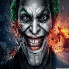 a close up of the joker 's face with a huge smile on his face .