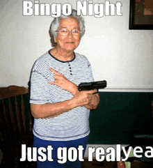 an elderly woman holding a gun with the caption " bingo night just got realyea "