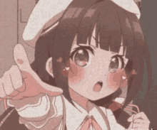 a cute anime girl is giving a thumbs up sign while wearing a hat .