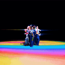 a group of women are posing for a photo with one wearing a shirt that says ' i love you ' on the side