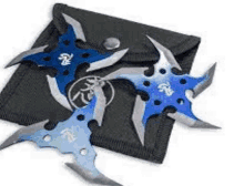 a pair of blue star throwing knives on a black envelope .