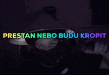 a person wearing a mask with the words prestan nebo budu kropit on the bottom