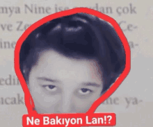 a close up of a person 's face with the words ne bakiyon lan