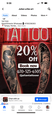 a phone screen shows an advertisement for julian uribe art tattoo studio