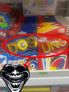 a troll face next to a box of dos uno