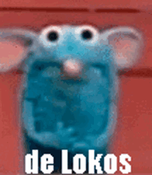 a close up of a stuffed animal with its mouth open and the words `` de lokos '' written below it .