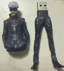 a usb flash drive that looks like a figurine of a person