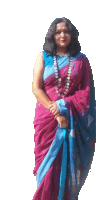 a woman wearing a purple and blue saree and a necklace