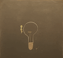 a drawing of a light bulb on a black board