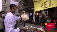 a man wearing a mask is holding a plate of food in front of a sign that says ' ret '