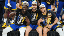 three golden state warriors players posing for a photo