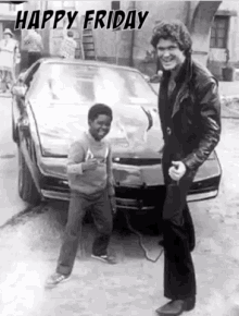 a black and white photo of a man and a boy standing next to a car with the words happy friday written above them .