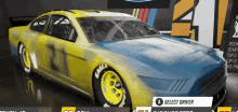 a yellow and blue race car with eagle tires on it