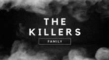 a poster for the killers family with smoke behind it