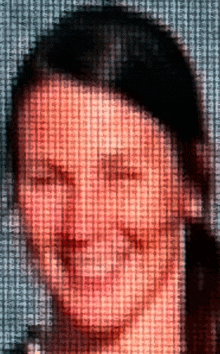 a close up of a woman 's face with a pattern of numbers on it