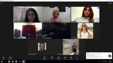 a screen shot of a zoom meeting with a few people