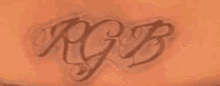 a close up of a tattoo on a person 's arm that says rjb