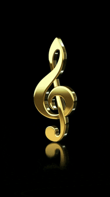 a gold treble clef with a black background