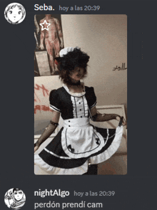 a picture of a girl dressed as a maid with the time 20:39 on the bottom