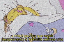 a cartoon of sailor moon laying in a bed with a caption .