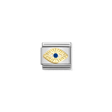 a gold evil eye charm with a blue stone in the center .