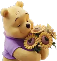 winnie the pooh holding a bouquet of sunflowers