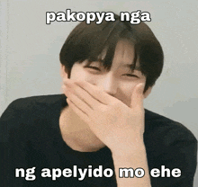 a man covering his mouth with his hand and a caption that reads pakopya nga ng apelyido mo ehe