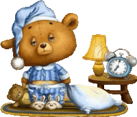 a teddy bear in pajamas is sitting next to an alarm clock and lamp