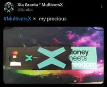 a twitter post by xia granta with a picture of a card that says money meets freedom