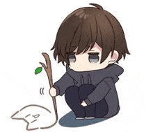 a chibi boy is sitting on the floor holding a stick and drawing a cat .