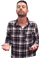 a man in a plaid shirt has his hands outstretched