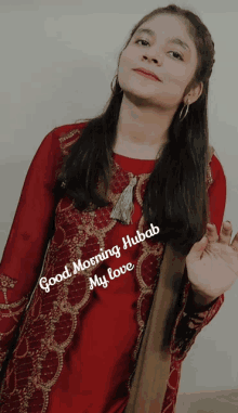 a woman in a red dress with the words good morning hubab my love written on it