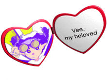 a heart shaped mirror that says vee my beloved on it