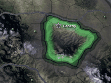 a map shows a green area with a star and the name grozny on it